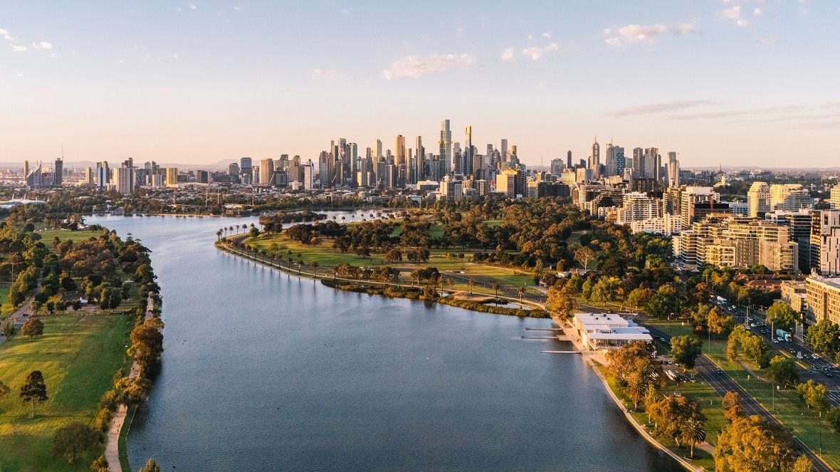 Aerial view of Melbourne's skyline with the Yarra river in the foreground